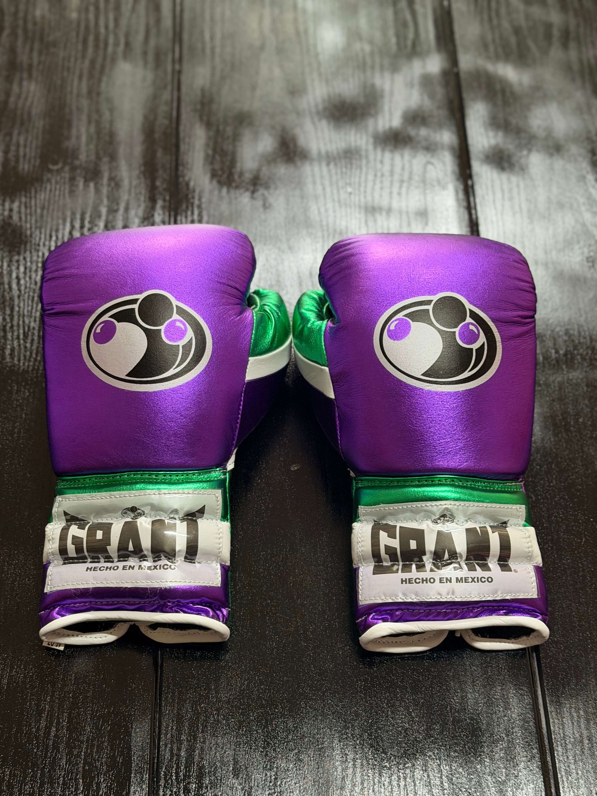 Grant Boxing Gloves in Purple/Green/White colorway - Professional Lace-Up training gloves