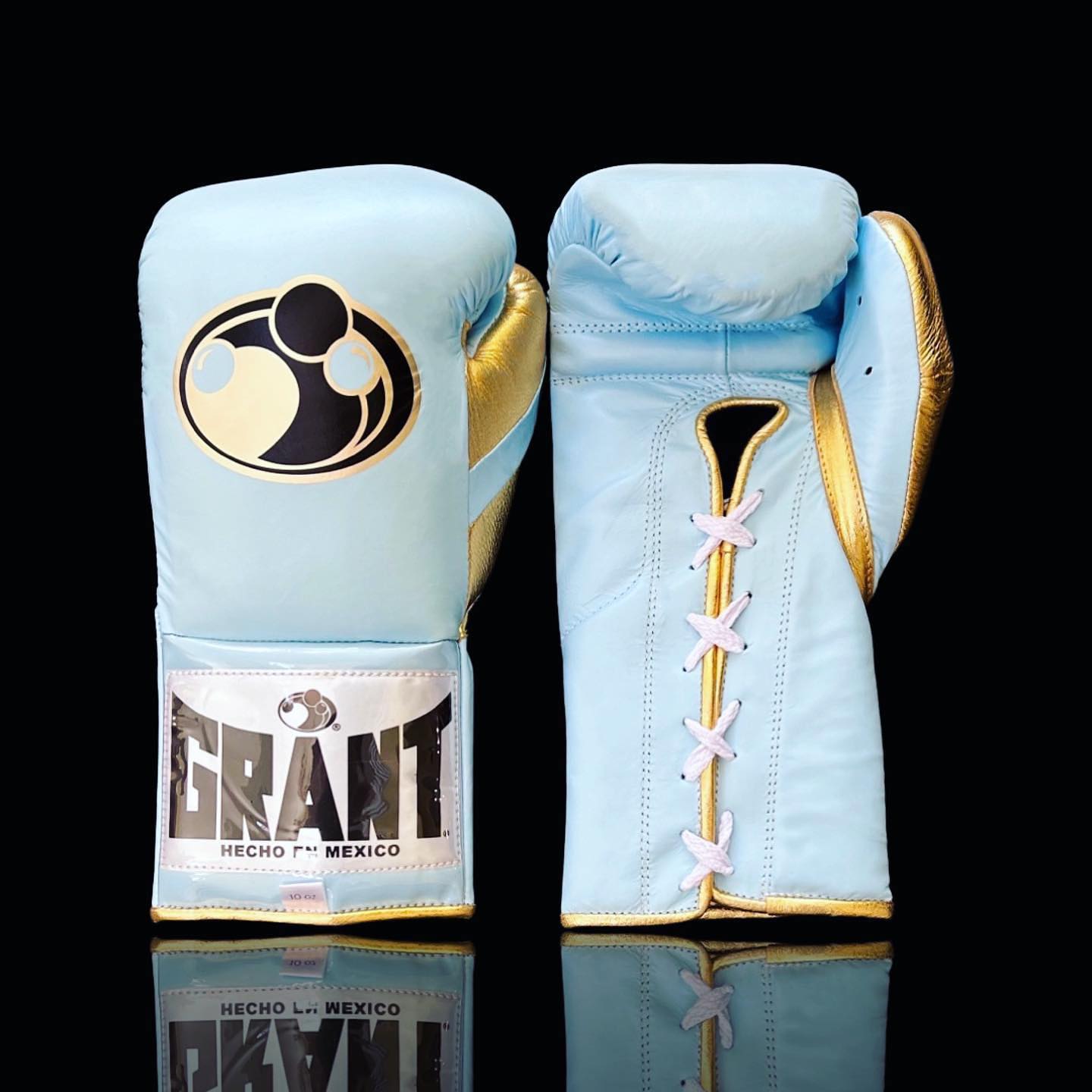 Grant Boxing Gloves in Sky-Blue/Gold colorway - Professional Lace-Up training gloves